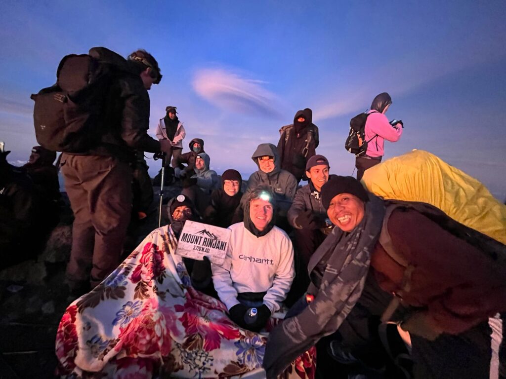 Mount Rinjani 3D2N trek via Senaru with crater rim view, Segara Anak Lake, and summit landscape.