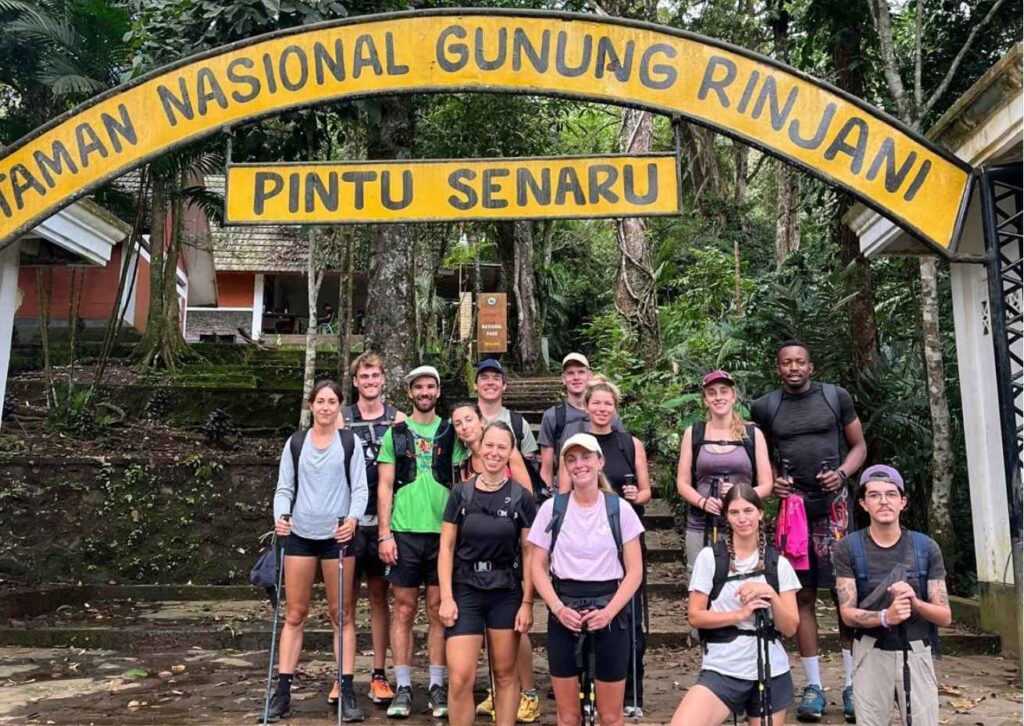 Trekking entrance gate at Senaru for Mount Rinjani hiking route surrounded by tropical forest