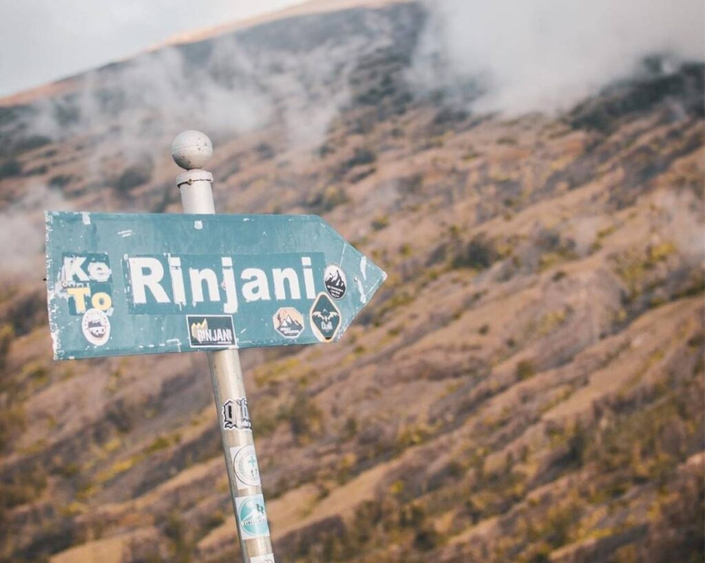 Mount Rinjani standing at 3,726 meters above sea level with sunrise views above Lombok Island